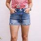 High Rise Ripped Hem Shorts - Medium Wash