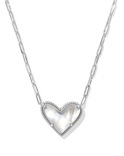 Silver heart-shaped pendant necklace on a white background